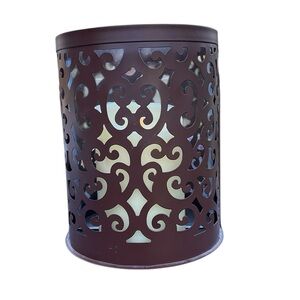 Filigree design wall sconce for flameless candle